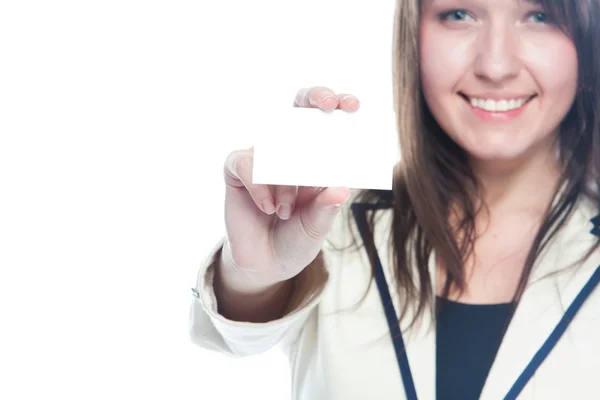 Young business woman with a business card — Stockfoto