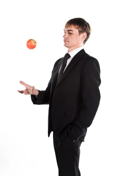 Hombre de negocios con una manzana roja —  Fotos de Stock