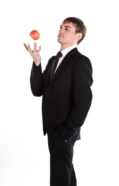 Affärsman med ett rött äpple — Stockfoto