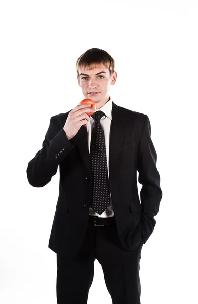 Hombre de negocios con una manzana roja —  Fotos de Stock