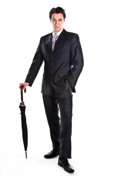 Homem de negócios com um guarda-chuva — Fotografia de Stock
