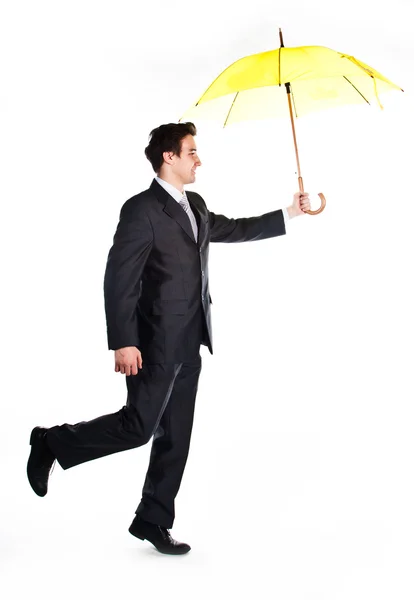 Bir şemsiye ile iş adamı — Stok fotoğraf
