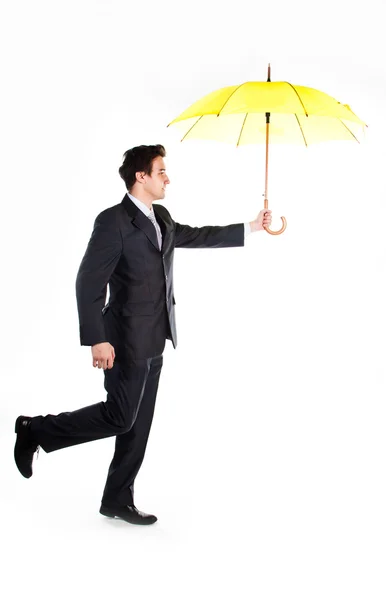 Деловой человек с зонтиком — стоковое фото