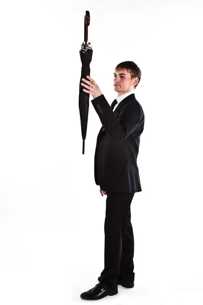 Affärsman med ett paraply — Stockfoto