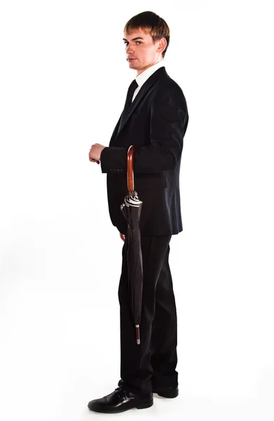 Homem de negócios com um guarda-chuva — Fotografia de Stock