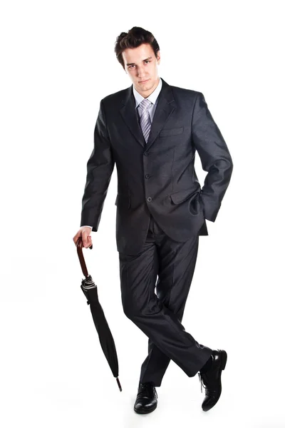 Affärsman med ett paraply — Stockfoto