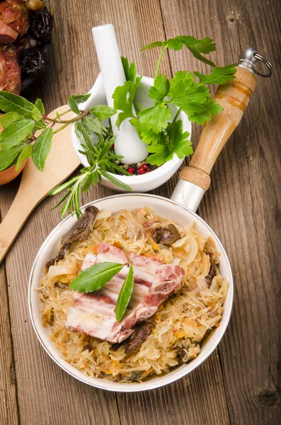 Sauerkraut in Polish kind with smoked meat — Stock Photo, Image