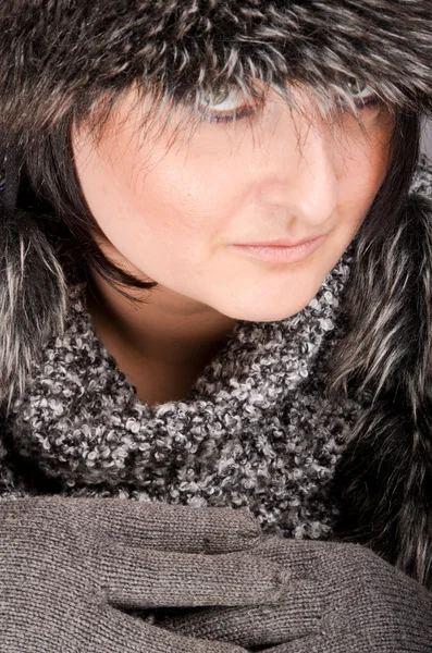Woman with fur cap — Stock Photo, Image