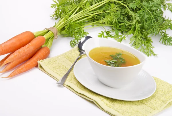 Gulerod suppe med foråret grøntsag - Stock-foto