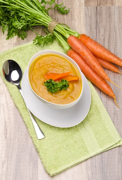 Carrot soup with spring vegetable — Stock Photo, Image