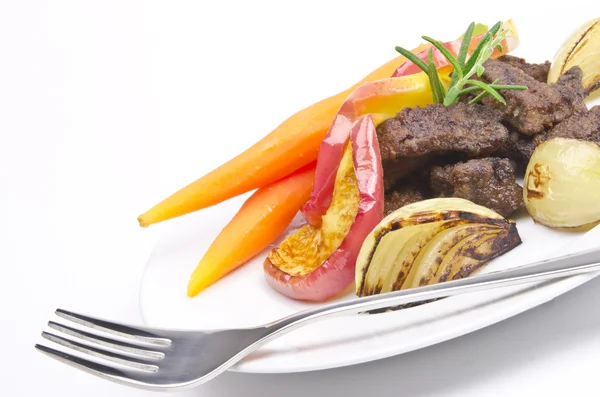 stock image Roasted liver with vegetables and apple