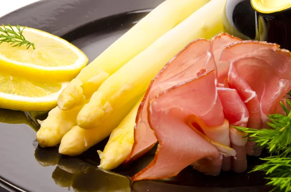 Asparagus, ham and sauce hollandaise — Stock Photo, Image