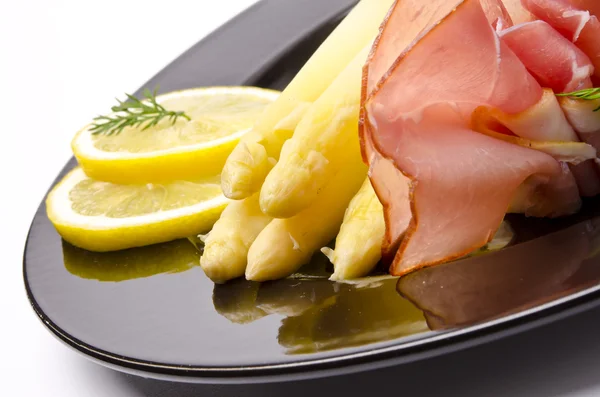 Asparagus, ham and sauce hollandaise — Stock Photo, Image