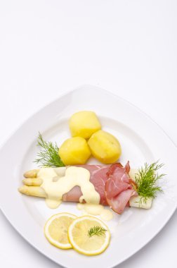 Asparagus, ham and sauce hollandaise clipart