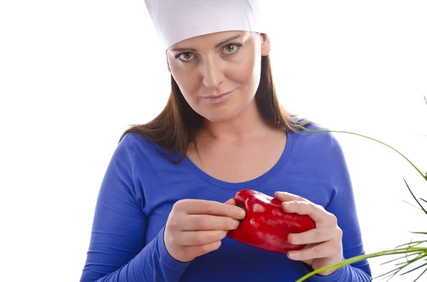 Kvinna med paprika och gurka — Stockfoto