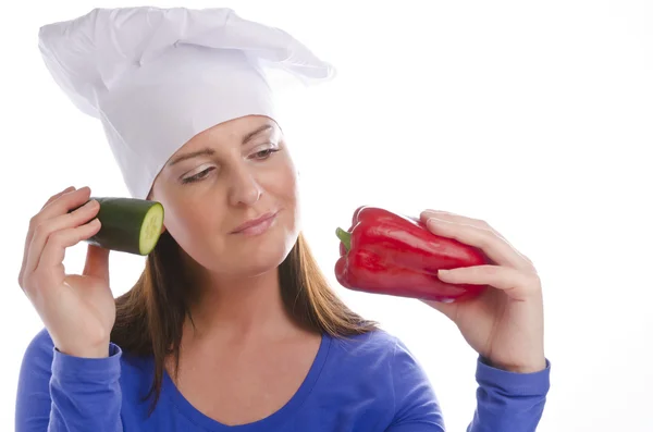 Vrouw met paprika en komkommer — Stockfoto