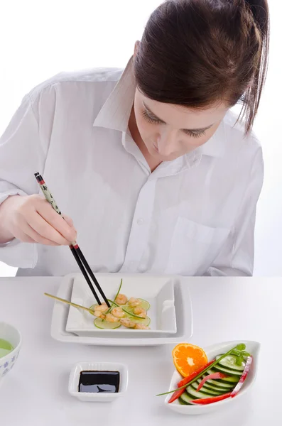 Kvinna med chopstick — Stockfoto