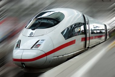 Modern Fast Passenger Commuter Train in the Station with Motion Blur clipart