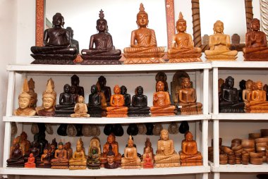 Buddha statues for selling at the shop clipart