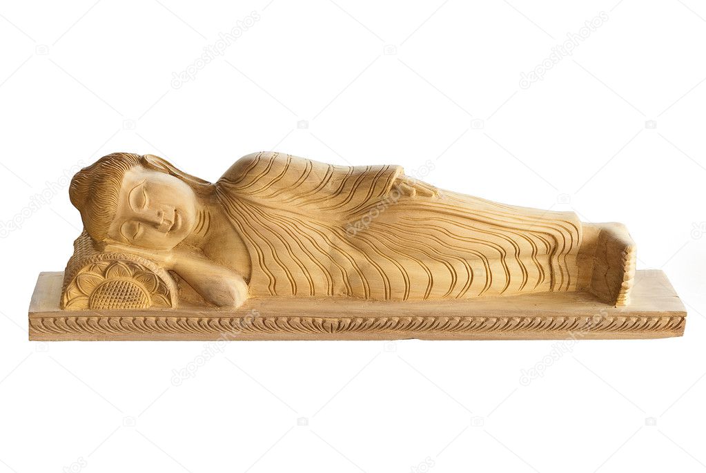 Wooden Buddha with eyes closed on white background
