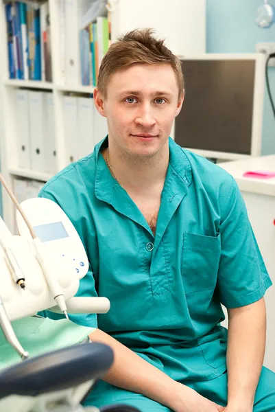 Dentist in his surgery — Stock Photo, Image