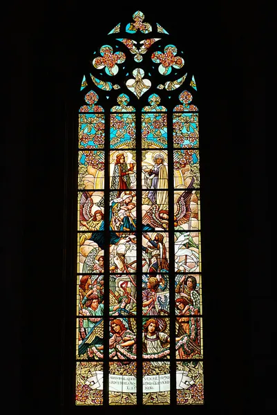 Stained glass window in old church — Stock Photo, Image