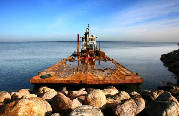 Boat with bulldozer Royalty Free Stock Images