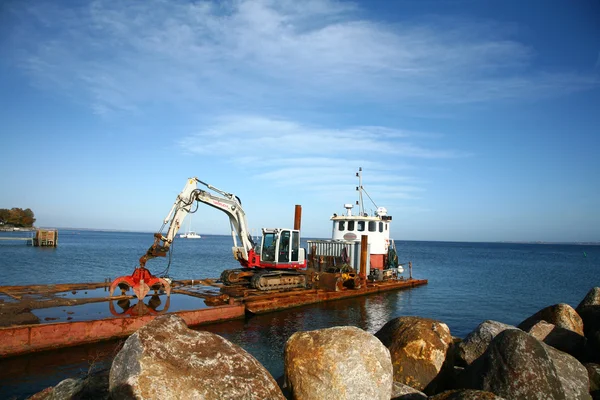 Boat with bulldozer Royalty Free Stock Photos