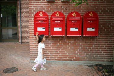 Girl and postboxes clipart