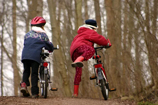 Children with bike — Stock Photo, Image