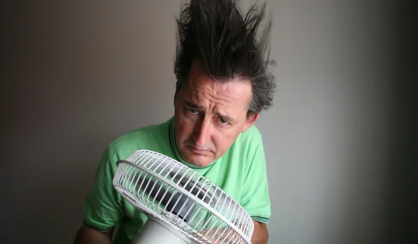 stock image Man with hair dryer