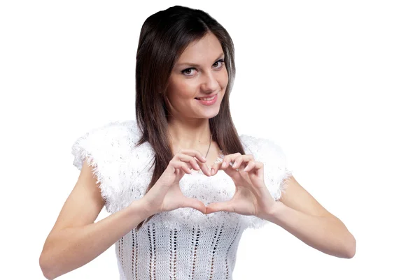Young woman making a heart shape — Stock Photo, Image