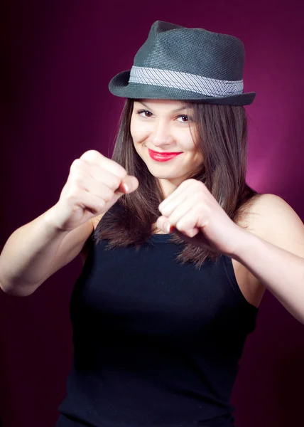 Young beautiful woman wearing stylish hat fighter — Stock Photo, Image