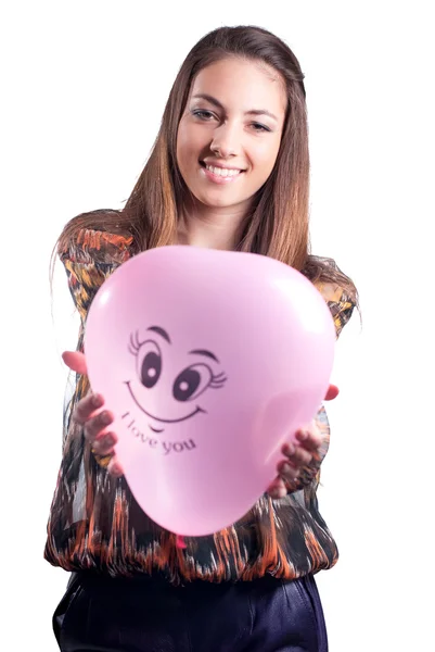 Joven mujer feliz con globo rosa — Foto de Stock