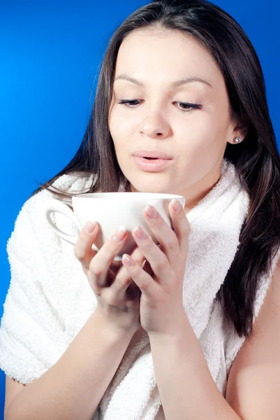 Young beautiful woman with a cup — Stock Photo, Image