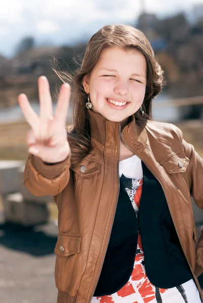 Girl showing three fingers — Stok fotoğraf