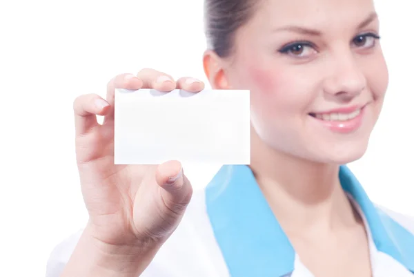 stock image Young female doctor showing white card