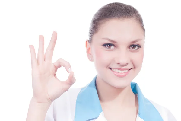 Young female doctor showing okay sign — Stock Photo, Image