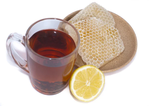 Черный чай, лимон и мед — стоковое фото