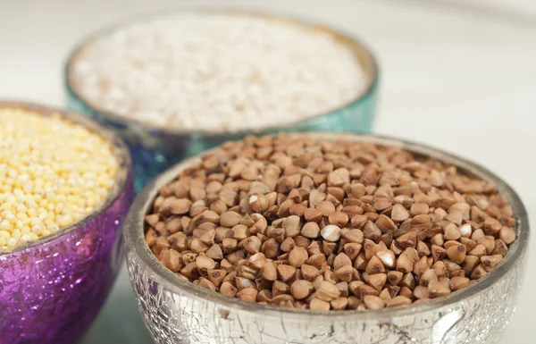 Three cups of grains — Stock Photo, Image