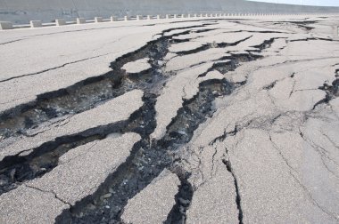 Cracked road after the disaster clipart
