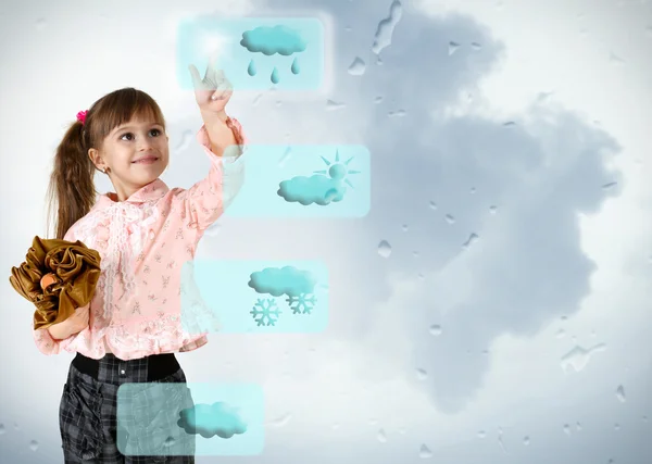 Kleines Mädchen drückt auf Wetterknopf — Stockfoto