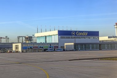 Condor wharft at Rhein Main airport in sunrise clipart