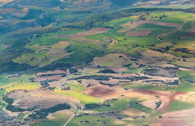 Aerial of countryside and fields around madrid clipart