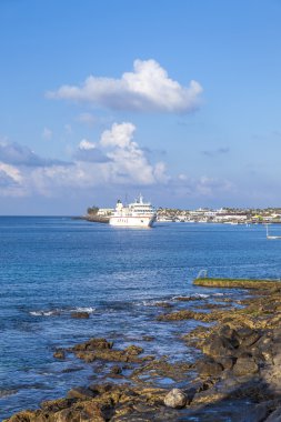 Ferry Volcan de Timanfaya AMAS enters the harbor clipart