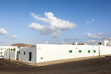 Facade f mediterranean house with closed shutterblinds