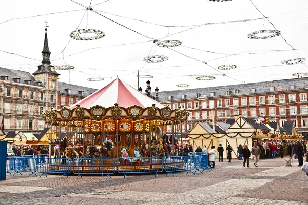 stock image Carousel for children at Madrids Plaza de major in Christmas tim