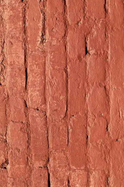 Parede de tijolo vermelho dá um padrão harmônico no sol — Fotografia de Stock