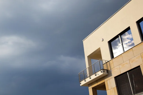 stock image Balcony of modern flat with dark clouds in rain