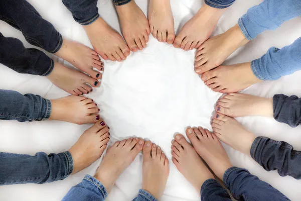 Feet of girls form a circle — Stock Photo, Image
